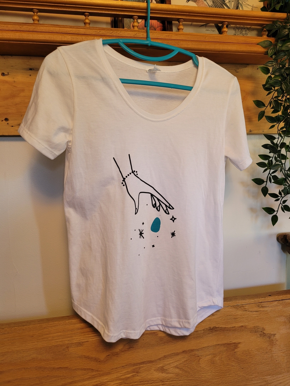 Women's White Graphic Scoop Neck Tee "Finding Seaglass"